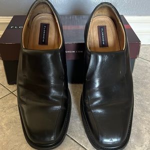 Florsheim black leather slip on dress shoe. Men’s size 11D